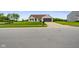 Charming single-story home featuring a well-maintained lawn, a two-car garage, and a cozy front porch at 204 Oakview Dr, Mooresville, IN 46158