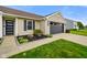 Well-maintained front yard with mature landscaping and a walkway to the front door at 204 Oakview Dr, Mooresville, IN 46158