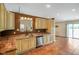 Well-lit kitchen featuring custom cabinets, stainless steel appliances and an open floor plan at 204 Oakview Dr, Mooresville, IN 46158