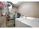 Functional laundry room featuring a washer, dryer and utility sink at 204 Oakview Dr, Mooresville, IN 46158