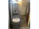 Bathroom featuring sink with cabinet and closet at 2146 Gent Ave, Indianapolis, IN 46202