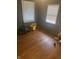 Bedroom with hardwood floors and natural light from two windows at 2146 Gent Ave, Indianapolis, IN 46202