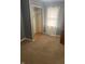 Bedroom featuring closet, window, carpeted floor, and painted walls at 2146 Gent Ave, Indianapolis, IN 46202