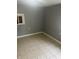 Bedroom with tile floor and window at 2146 Gent Ave, Indianapolis, IN 46202
