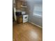 Kitchen featuring essential appliances and laminate floors at 2146 Gent Ave, Indianapolis, IN 46202
