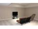 Finished basement with plush carpeting, neutral paint, and comfortable seating area at 2219 Stone Manor Ct, Avon, IN 46123