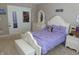 Bright bedroom featuring a white wood bed frame, a white dresser, and a white sliding door closet at 2219 Stone Manor Ct, Avon, IN 46123