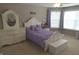 Comfortable bedroom featuring a matching bed, dresser, and soft purple accents at 2219 Stone Manor Ct, Avon, IN 46123