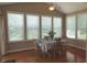 Bright dining area featuring multiple large windows providing ample natural light at 2219 Stone Manor Ct, Avon, IN 46123