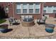 Cozy outdoor patio with seating area and fire pit, perfect for relaxing and entertaining at 2219 Stone Manor Ct, Avon, IN 46123