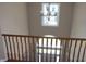 Bright foyer featuring an elegant chandelier and a view of the front door from the second floor at 2219 Stone Manor Ct, Avon, IN 46123