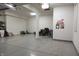 This garage has plenty of room for storage with a coated epoxy floor at 2219 Stone Manor Ct, Avon, IN 46123