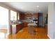 Spacious kitchen featuring stainless steel appliances, granite countertops and hardwood floors at 2219 Stone Manor Ct, Avon, IN 46123