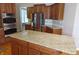 Gourmet kitchen featuring granite island, stainless steel appliances, and abundant cabinetry at 2219 Stone Manor Ct, Avon, IN 46123