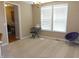 Open living room with keyboard and comfortable seating area near bright windows at 2219 Stone Manor Ct, Avon, IN 46123