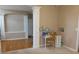 Bright home office with a white desk and natural light at 2219 Stone Manor Ct, Avon, IN 46123