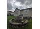 A picturesque backyard highlighting the stone fire pit and outdoor living space at 2680 Newington Ln, Carmel, IN 46074