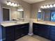 Primary bathroom featuring dual sinks, tile floor, and plenty of counter space at 2680 Newington Ln, Carmel, IN 46074