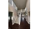 Grand foyer with high ceilings, hardwood floors, and a staircase at 2680 Newington Ln, Carmel, IN 46074