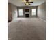 Bright living room features a fireplace, neutral paint and carpet at 2680 Newington Ln, Carmel, IN 46074