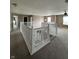 Upstairs loft area with white railing and neutral carpet at 2680 Newington Ln, Carmel, IN 46074
