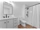 Modern bathroom featuring a sleek vanity, elegant mirror, and a stylish, renovated shower at 28 Hudson Bay Ln, Greenwood, IN 46142