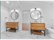 Bright bathroom with modern double vanity, elegant mirrors, and stylish fixtures at 28 Hudson Bay Ln, Greenwood, IN 46142