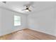Bright bedroom with hardwood floors, natural light, and ceiling fan at 28 Hudson Bay Ln, Greenwood, IN 46142