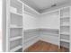 Spacious walk-in closet with built-in shelving and natural light at 28 Hudson Bay Ln, Greenwood, IN 46142