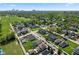 A high angle aerial shot captures the neighborhood streetscapes and skyline at 2919 Macpherson Ave, Indianapolis, IN 46205