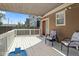 Spacious white deck features a shade awning and outdoor seating, creating a cozy outdoor space at 2919 Macpherson Ave, Indianapolis, IN 46205