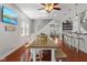 Spacious dining area with open concept design, hardwood floors, and bar seating at 2919 Macpherson Ave, Indianapolis, IN 46205