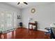 Bright entryway featuring hardwood floors and decorative glass front door at 2919 Macpherson Ave, Indianapolis, IN 46205