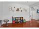 Cozy living room area showcasing beautiful hardwood floors and neutral decor at 2919 Macpherson Ave, Indianapolis, IN 46205