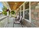 Relaxing front porch with comfortable seating and natural wood ceiling accents at 2919 Macpherson Ave, Indianapolis, IN 46205