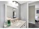 Well-lit bathroom with a modern vanity, elegant mirror, and contemporary fixtures at 3002 Horse Hill W Dr, Indianapolis, IN 46214