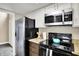 Modern kitchen with stainless steel appliances, ample storage, and a convenient layout at 3002 Horse Hill W Dr, Indianapolis, IN 46214