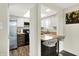 Bright kitchen with stainless steel appliances, breakfast bar seating, and ample countertop space at 3002 Horse Hill W Dr, Indianapolis, IN 46214