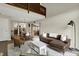 Spacious living room with open floor plan, modern furnishings, and wood floors at 3002 Horse Hill W Dr, Indianapolis, IN 46214