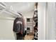Walk-in closet featuring shelving and clothes-hanging bars at 3002 Horse Hill W Dr, Indianapolis, IN 46214