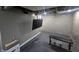 Finished basement featuring a mounted TV and weight bench in the area at 3021 Eastern Ave, Indianapolis, IN 46218