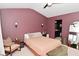 Tastefully decorated bedroom featuring high ceilings and large window at 3110 W New York St, Indianapolis, IN 46222