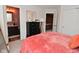 Spacious bedroom with a plush bed and en suite bathroom at 3110 W New York St, Indianapolis, IN 46222