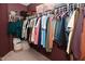 Walk-in closet with ample hanging space at 3110 W New York St, Indianapolis, IN 46222