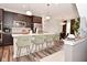 Modern kitchen featuring a large island with seating and sleek stainless steel appliances at 3110 W New York St, Indianapolis, IN 46222