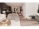View of open concept living room that connects to the kitchen and dining area at 3110 W New York St, Indianapolis, IN 46222