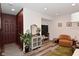 Inviting living space with a console, decor, an accent chair, and wood-look flooring at 3110 W New York St, Indianapolis, IN 46222