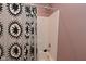 Shower with white walls and flower patterned shower curtain at 3110 W New York St, Indianapolis, IN 46222