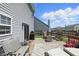 Well-appointed backyard deck with outdoor seating, a grill, and a cozy fire pit for entertaining guests at 3341 Enclave Xing, Greenwood, IN 46143