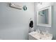Coastal-themed bathroom with single sink, white vanity, and decor at 3341 Enclave Xing, Greenwood, IN 46143